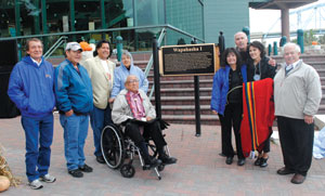 The goup by the Chief Wabasha signs